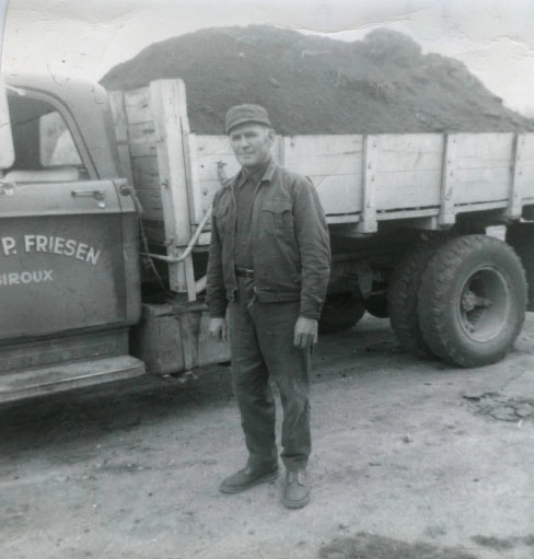 Friesen Hauling old photo worker
